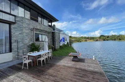 Casa térrea à venda condomínio encontro das águas r$ 10.800.000,00 frente para lagoa, maravilhosa, terreno 4.000 m²,piscina e quiosque vista lagoa