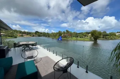 Casa térrea à venda condomínio encontro das águas r$ 10.800.000,00 frente para lagoa, maravilhosa, terreno 4.000 m²,piscina e quiosque vista lagoa