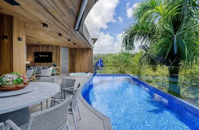 Casa à venda alphaville ii salvador r$ 5.800.000,00 armários, 5/4, suíte máster 40 m², piscina aquecida, ofurô, área gourmet, brinquedoteca!