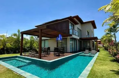 Casa à venda em praia do forte, condomínio ilha dos pássaros r$ 3.850.000,00 mobiliada, porteira fechada, casa nova, piscina, espaço gourmet, 5 suítes