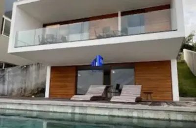 Casa à venda alphaville ii salvador r$ 3.900.000,00 piscina, espaço gourmet climatizado, sala de tv, 4 suítes, closet, área construída 380 m²!