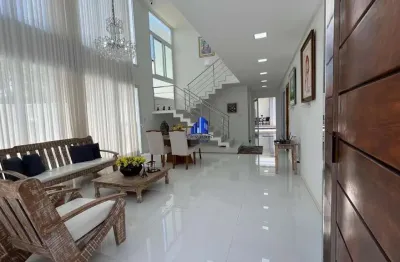 Casa à venda alphaville litoral norte i r$ 2.690.000,00 nascente, 4 suítes, piscina com espaço gourmet climatizado, sala ampla, armários, cozinha com despensa, área construída 285 m².