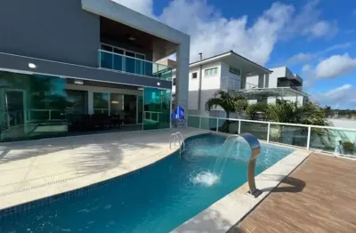 Casa à venda alphaville ii salvador r$ 5.200.000,00 porteira fechada, mobiliada, móveis novos, 4 suítes, 4 closets, melhor localização do condomínio