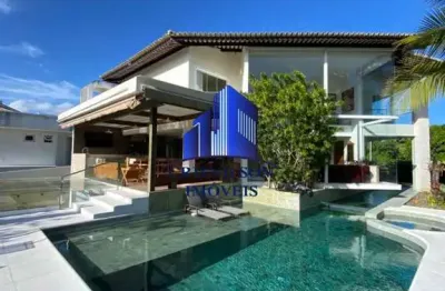 Casa á venda buscaville em busca vida r$ 4.900.000,00 decorada, piscina com área gourmet, 3 suítes sendo 1 suíte máster com closet e banheira, energia fotovoltaica, gabinete.