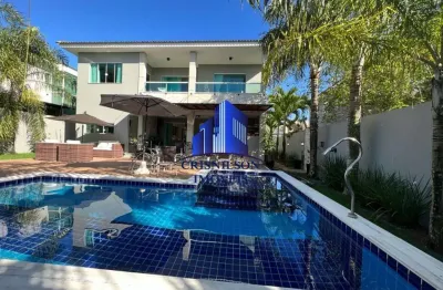 Casa à venda alphaville litoral norte i r$ 2.400.000,00, piscina, espaço gourmet, 4 suítes, hidro, energia fotovoltaica, sala com pé direito duplo!