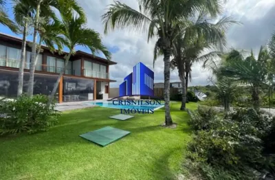 Casa à venda em praia do forte r$ 8.500.000,00, condomínio piscinas naturais, decorada, porteira fechada, móveis novos, poucos metros da praia, área construída 450 m², terreno 700 m²!