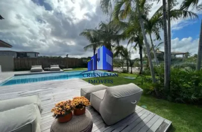 Casa à venda em praia do forte r$ 8.500.000,00, condomínio piscinas naturais, decorada, porteira fechada, móveis novos, poucos metros da praia, área construída 450 m², terreno 700 m²!