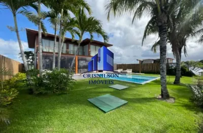 Casa à venda em praia do forte r$ 8.500.000,00, condomínio piscinas naturais, decorada, porteira fechada, móveis novos, poucos metros da praia, área construída 450 m², terreno 700 m²!