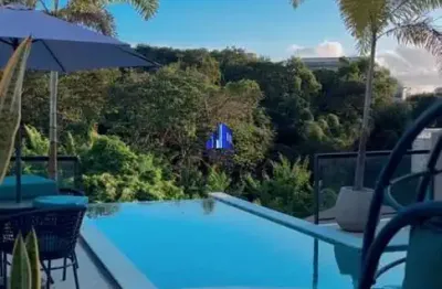 Casa à venda em alphaville ii salvador, r$ 3.700.000,00 decorada, piscina, ofurô, espaço gourmet, 4 suítes, sala ampla, energia solar, vista para área