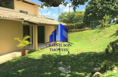 Casa à venda condomínio encontro das águas, r$ 3.200.000,00, frente para lagoa, 4/4, varandas, campo de futebol privativo, terreno 3.373,00 m²