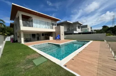 Casa à venda alphaville ii salvador r$ 4.990.000,00 piscina, área gourmet, terreno plano, 4 suítes, suíte máster com closet e banheira!