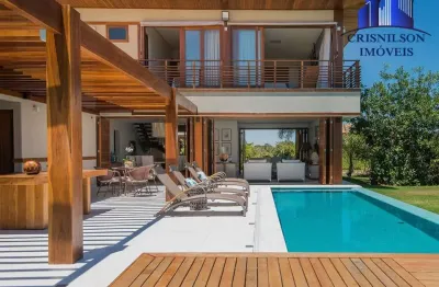 Casa à venda em praia do forte, bahia  r$ 7.500.000,00, condomínio piscinas naturais - acácias, magnífico projeto, decorada, 5 suítes, piscina!