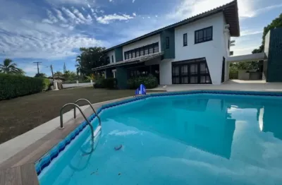 Casa à venda condomínio encontro das águas r$ 2.950.000,00 piscina, 5 suítes, terreno grande 5.500,00 m², casa 550,00 m², garagem para 6 carros!