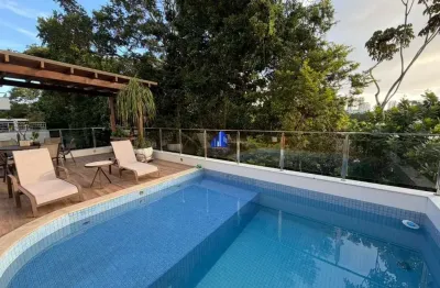 Casa à venda em alphaville i salvador r$ 5.500.000,00 piscina, área gourmet, 4 suítes, suíte máster com banheira, garagem fechada para 05 carros, energia fotovoltaica