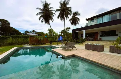 Casa à venda no condomínio encontro das águas r$ 7.500.000,00 nova, terreno 4.640,00 m², casa 600 m², piscina grande com área gourmet, 5 suítes, closet, banheira, garagem para 10 carros.