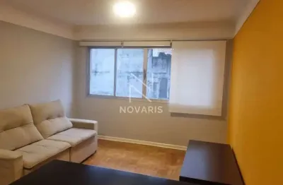 Apartamento a venda com 2 dormitórios, sala, cozinha, 2 banheiros, 2 vagas.