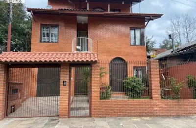 Casa com 5 quartos à venda na rua mansueto pezzi, 1126, salgado filho, caxias do sul por r$ 980.000