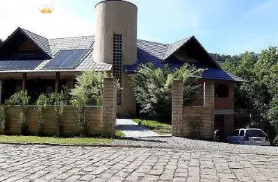 Casa em condomínio fechado com 5 quartos à venda no Linha 40, Caxias do Sul  por R$ 2.200.000