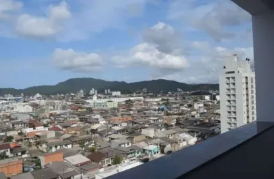 Excelente apartamento com 2 dormitórios sendo uma suíte no bairro são vicente em itajaí sc