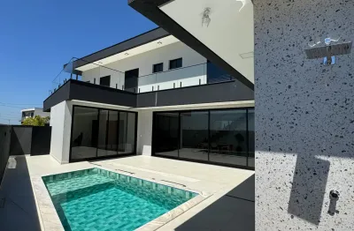 Sobrado moderno com piscina aquecida e 4 suites no villagio wanel