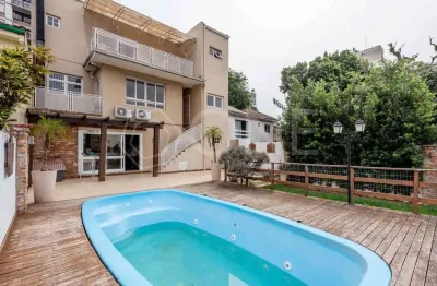 Casa em condomínio fechado com 3 quartos para alugar na Rua Luzitana, 1098, Higienópolis, Porto Alegre por R$ 15.000
