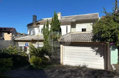 Casa com 2 quartos à venda na rua luiz voelcker, 825, três figueiras, porto alegre por r$ 2.200.000