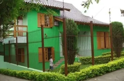 Casa com 4 quartos à venda no jardim planalto, porto alegre  por r$ 970.000