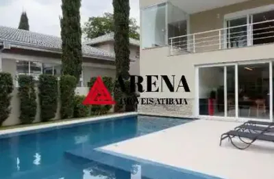 Residência de Luxo no Condomínio Porto Atibaia: 4 Quartos, 4 Suítes, 3 Salas, 6 Banheiros, 8 Vagas de Garagem, 570m². Venha Conferir!