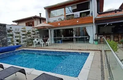 Casa 4 dormitótios sendo 3 suites a venda no condominio carmel , na granja viana cotia