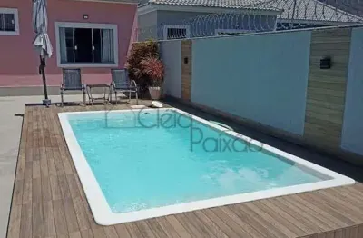 Belíssima casa com dois quartos,  piscina e área gourmet à venda em itaipuaçú.
