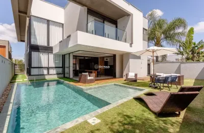 Casa em condomínio fechado com 4 quartos à venda na rua camarinhas, 221, campeche, florianópolis por r$ 4.200.000