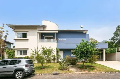 Casa em condomínio fechado com 4 quartos à venda na rua vereador osni ortiga, 2883, lagoa da conceição, florianópolis por r$ 3.950.000