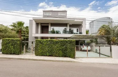 Casa em condomínio fechado com 5 quartos à venda na rodovia doutor antônio luiz moura gonzaga, 95, rio tavares, florianópolis por r$ 7.900.000
