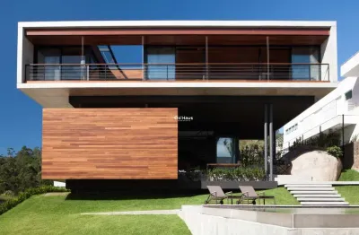 Casa em condomínio fechado com 3 quartos à venda na estrada haroldo soares glavan, 4690, cacupé, florianópolis por r$ 7.650.000