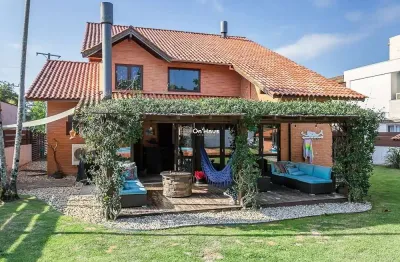 Casa em condomínio fechado com 3 quartos à venda na rodovia doutor antônio luiz moura gonzaga, 647, rio tavares, florianópolis por r$ 4.500.000