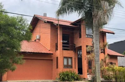 Casa em condomínio fechado com 3 quartos à venda na rodovia doutor antônio luiz moura gonzaga, 647, rio tavares, florianópolis por r$ 4.500.000