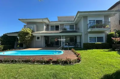 Casa em condomínio fechado com 5 quartos à venda na rodovia doutor antônio luiz moura gonzaga, 383, rio tavares, florianópolis por r$ 4.500.000