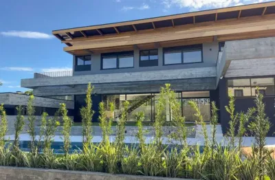 Casa em condomínio fechado com 4 quartos à venda na rua vereador osni ortiga, 3033, lagoa da conceição, florianópolis por r$ 6.900.000