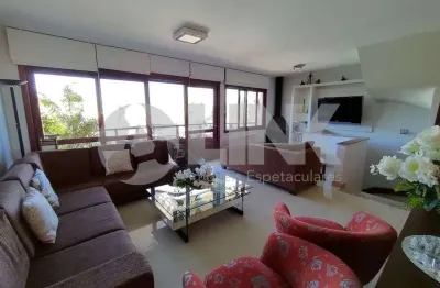 Casa em condomínio com 4 dormitórios e 4 vagas de garagem à venda no bairro menino deus em porto alegre próximo ao nacional