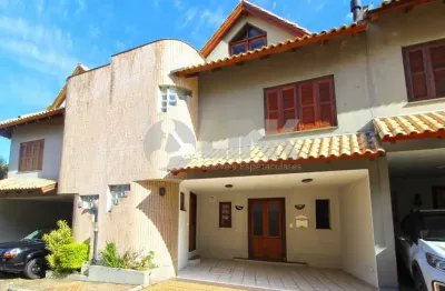 Casa em condomínio 3 dormitórios com 2 vagas de garagem à venda no bairro cristal em porto alegre próximo ao barra shopping