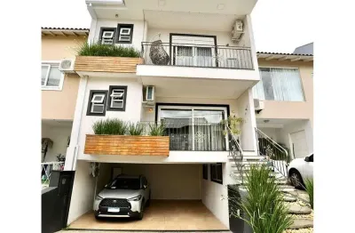 Casa em condomínio fechado com 4 quartos e 4 vagas de garagem à venda no bairro passo das pedras em porto alegre.