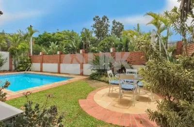 Casa de 3 quartos com 4 vagas à venda no bairro três figueiras em porto alegre