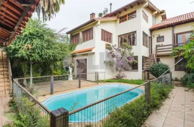 Casa 6 dormitórios 3 suítes e 3 vagas de garagem à venda no bairro boa vista em porto alegre próxima da anita garibaldi com vista para o country club