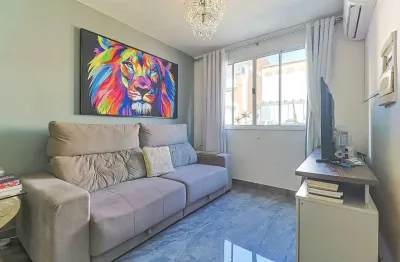 Casa em condomínio fechado com 2 quartos à venda na rua tenente ary tarrago, 1720, jardim itu sabará, porto alegre por r$ 284.079