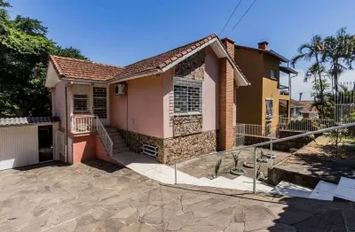 Casa em condomínio fechado com 3 quartos à venda na Acesso das Palmeiras, 283, Santa Tereza, Porto Alegre por R$ 460.000