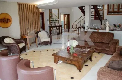 Casa de 5 dormitórios à venda com 4 vagas de garagem em porto alegre, no bairro chácara das pedras