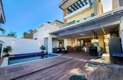 Casa de alto padrão com 5 suítes e lazer completo condomínio botânica nature