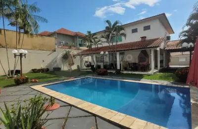 Casa com piscina cond. ponta negra i/ 3 suítes/ documentação 100% regularizada