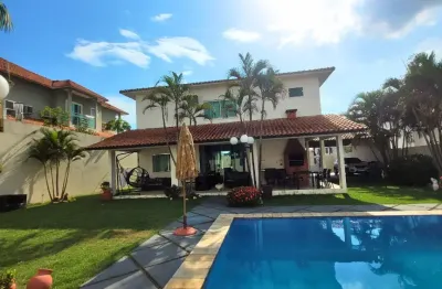 Casa com Piscina Cond. Ponta Negra I/ 3 suítes/ Documentação 100% regularizada