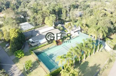 Casa c/ 7 dorms (4 suítes) quadra de tênis, beach tennis em terreno de 4696 m².